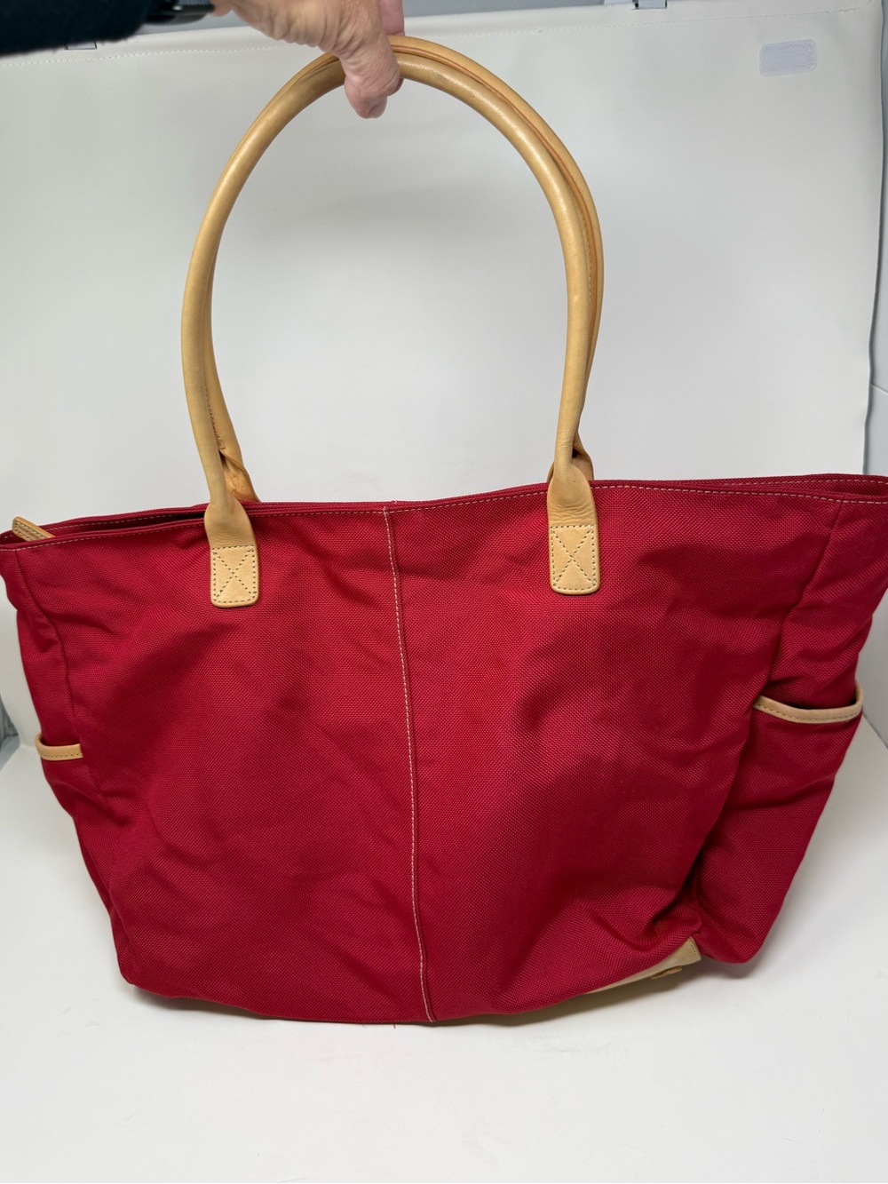 Levenger classic red canvas shoulder tote bag trimmed with tan leather